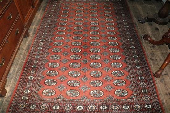 Bokhara orange ground rug & Persian pink ground rug(-)